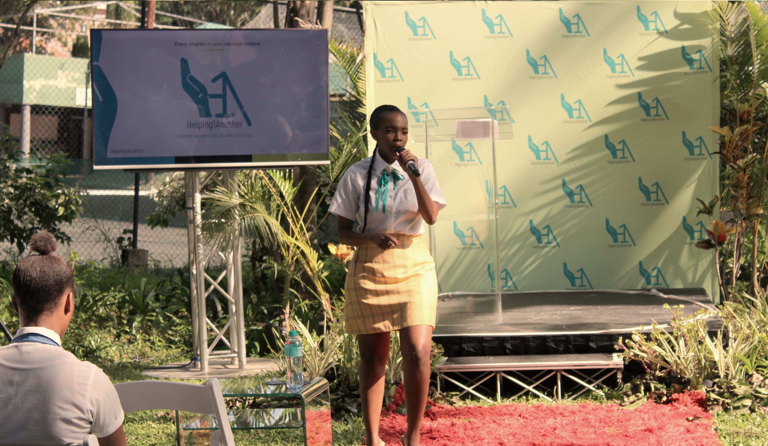 Founder with students